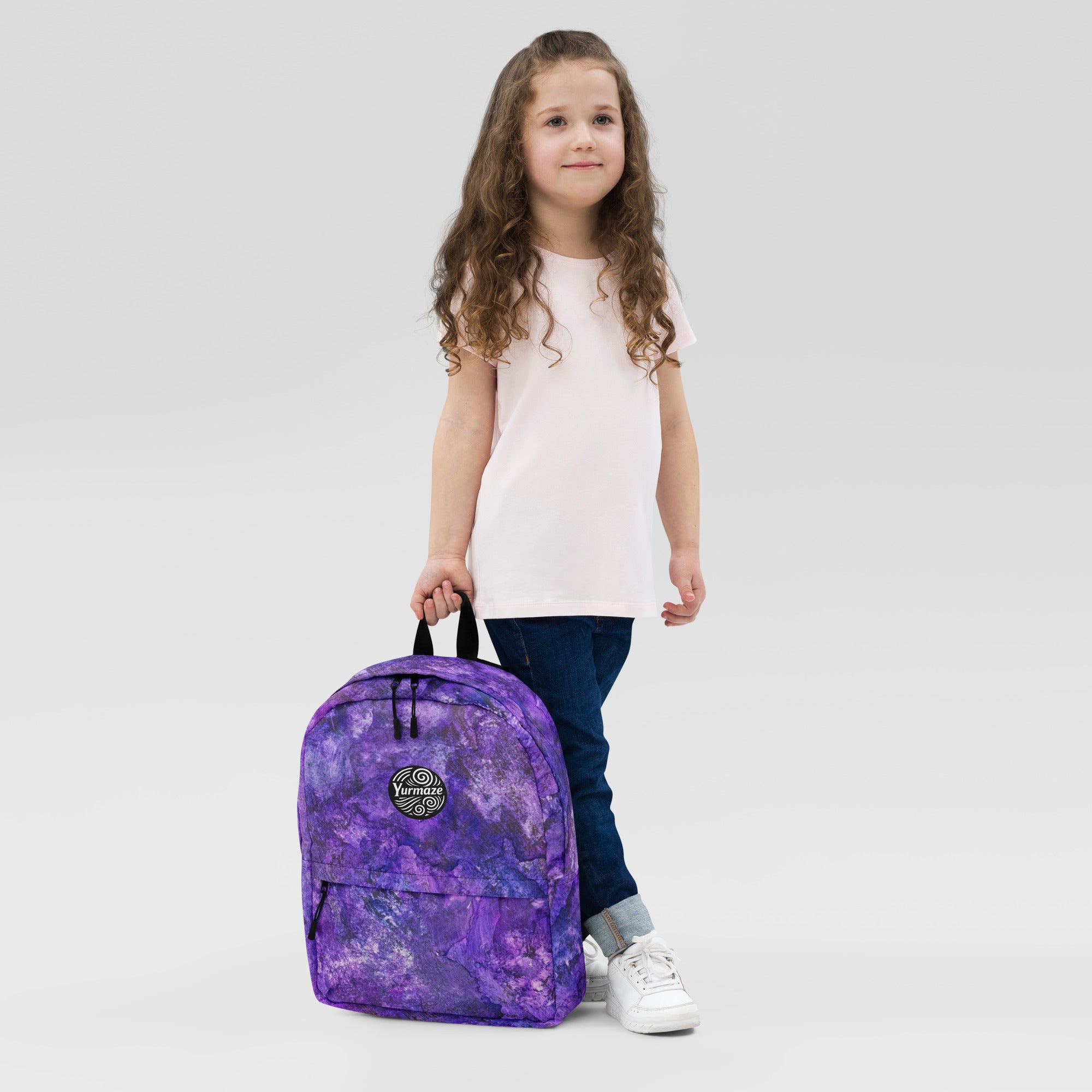 Child with a Yurmaze Purple Infusion medium backpack with abstract alcohol ink artwork