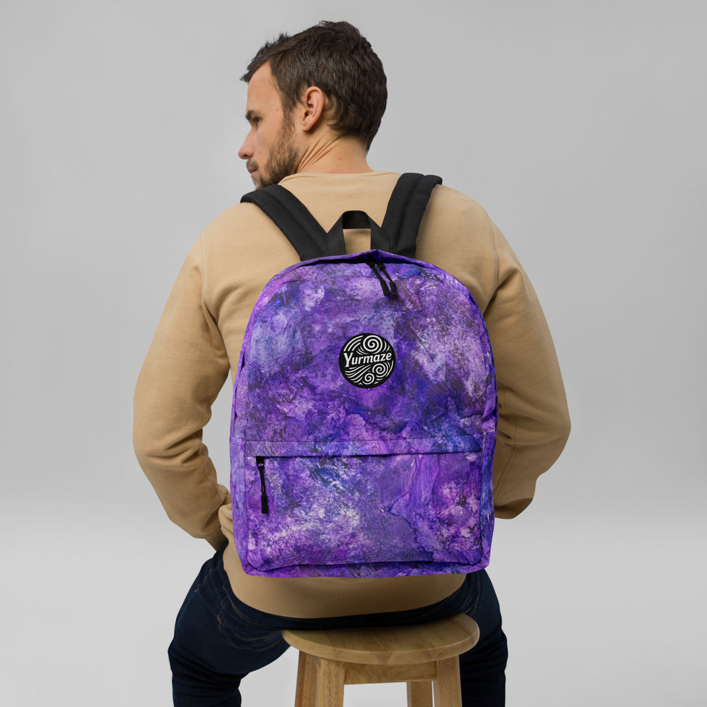 lifestyle view of Yurmaze Purple Infusion medium backpack with abstract alcohol ink artwork