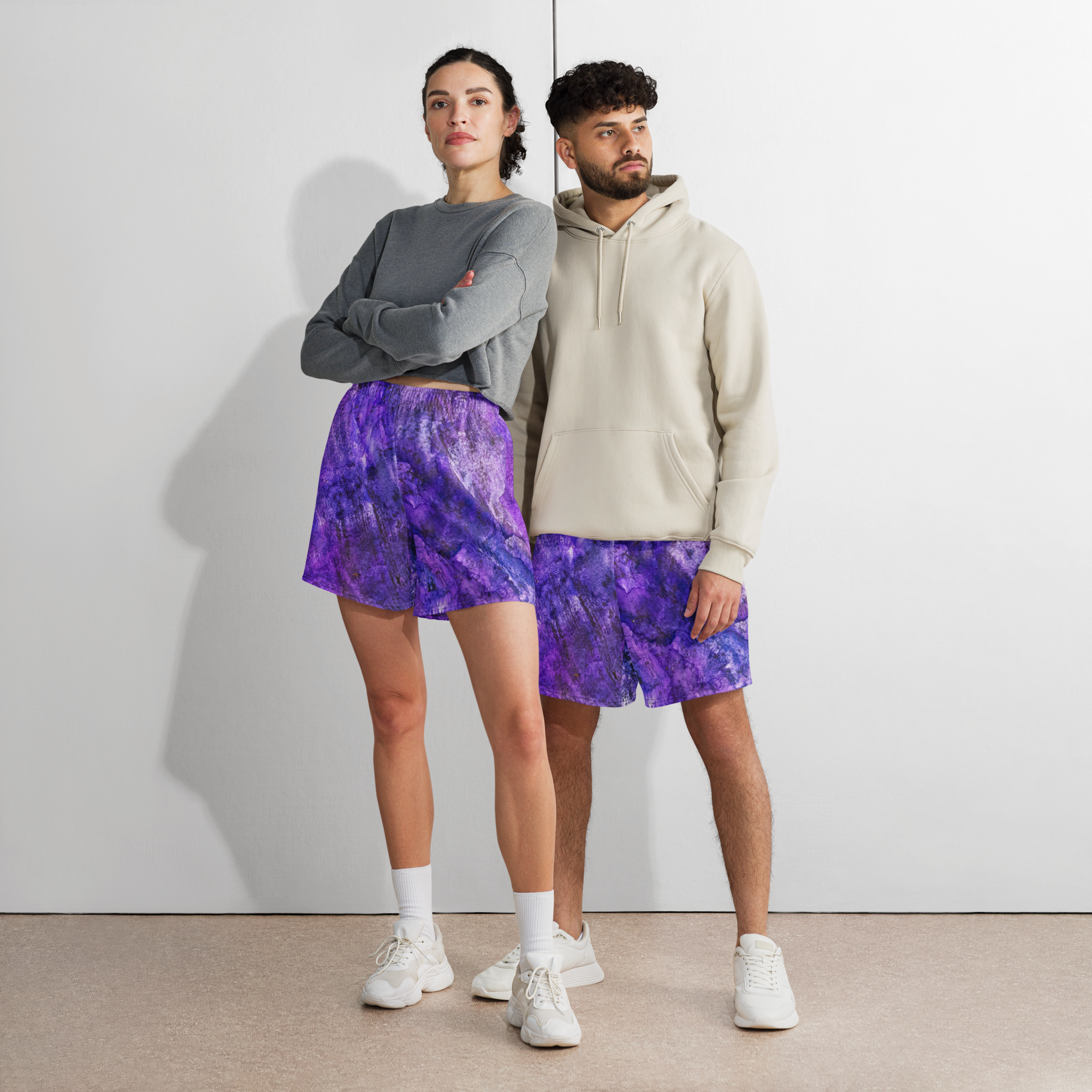 Lifestyle view of Yurmaze Purple Infusion eco-friendly  unisex sports long shorts with abstract alcohol ink design