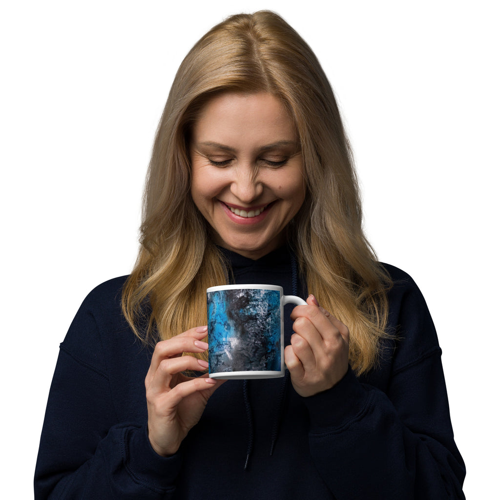 Drink with style with this Yurmaze Blue Infusion ceramic mug with abstract alcohol ink design