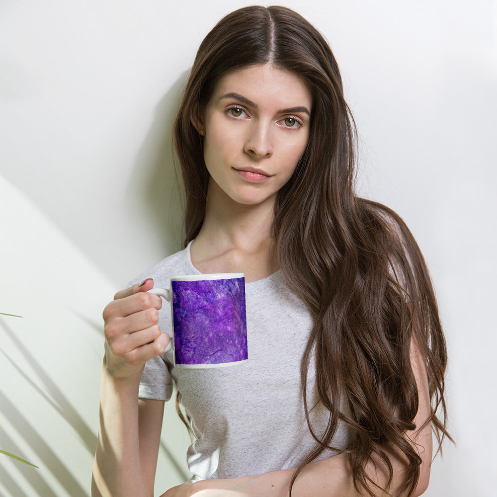 Lifestyle view of a Yurmaze Purple Infusion ceramic mug with abstract alcohol ink design